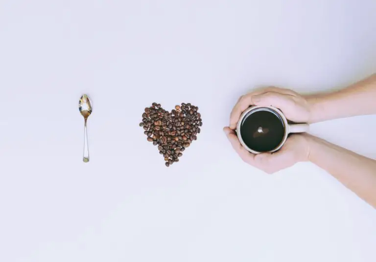 Flat Lay Photography of Mug and Coffee Bean